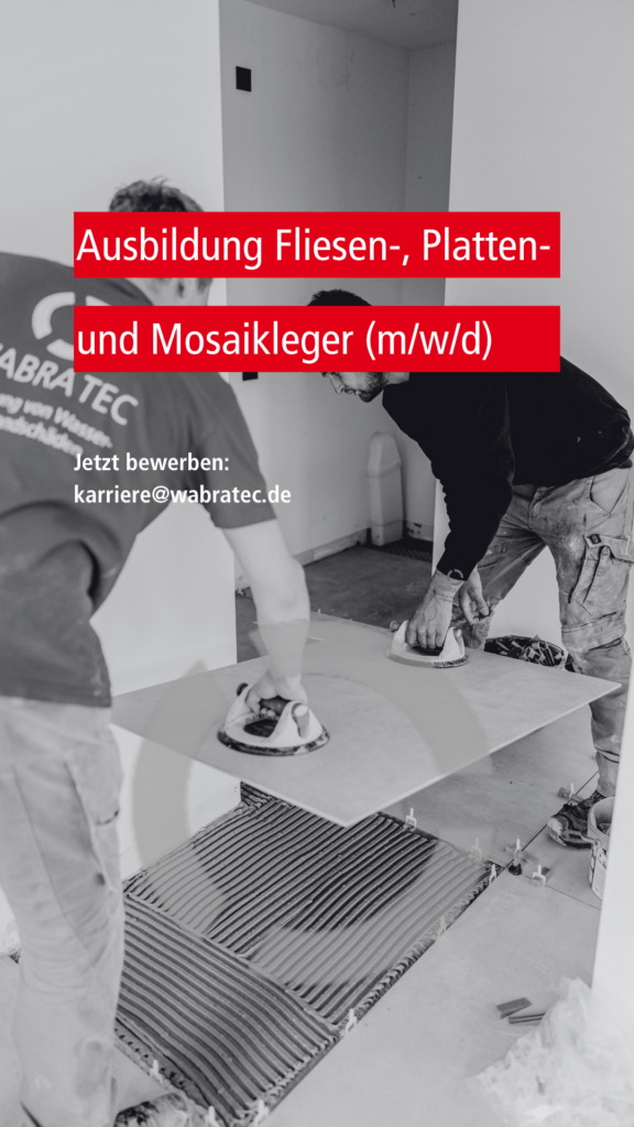 Zwei Fliesenleger der Firma WABRA TEC legen eine Großformatbodenfliese.